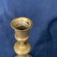 Old Louis-style brass candlestick