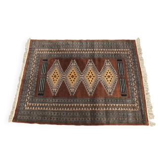 Handmade Pakistani wool rug Oriental wollen carpet stamped 1960 128x218cm