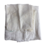 Nappe en linon blanc avec motifs fleurs en broderie ton sur ton. + 7 serviettes.