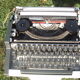Revised typewriter and Olympia Traveller luxury with his satchel