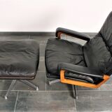Armchair and footstool by André Vandenbeuck for Strässle in black leather