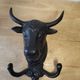 Wall-mounted coat hook in cast iron, bull's head and Camargue cross