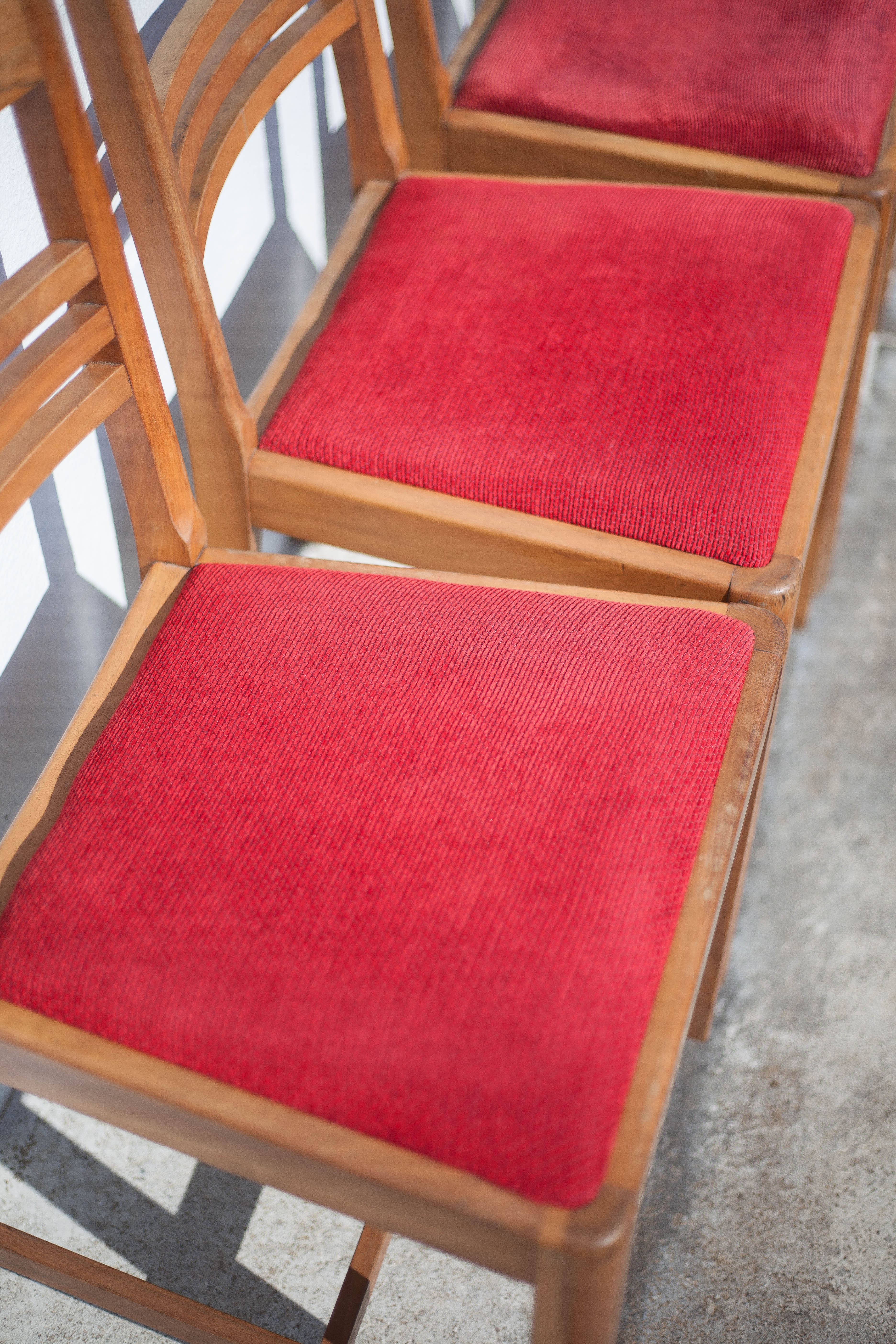 4 wooden chairs and velvet fabric