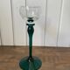 crystal wine glass on green stem