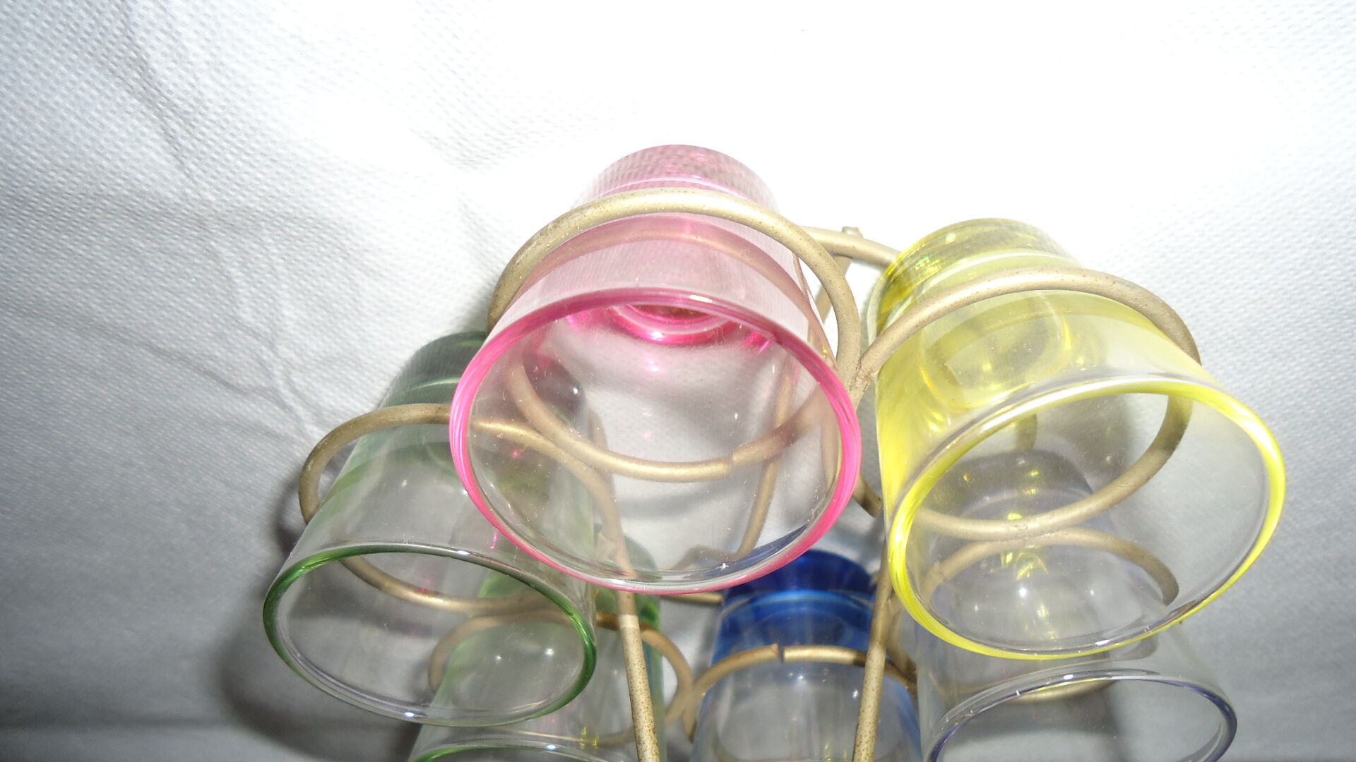 Liqueur glasses on vintage stand