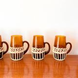 set of carafe and 6 cups in amber glass with wicker from the 70s