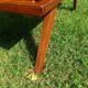 Rattan and wood splayed-leg chest of drawers