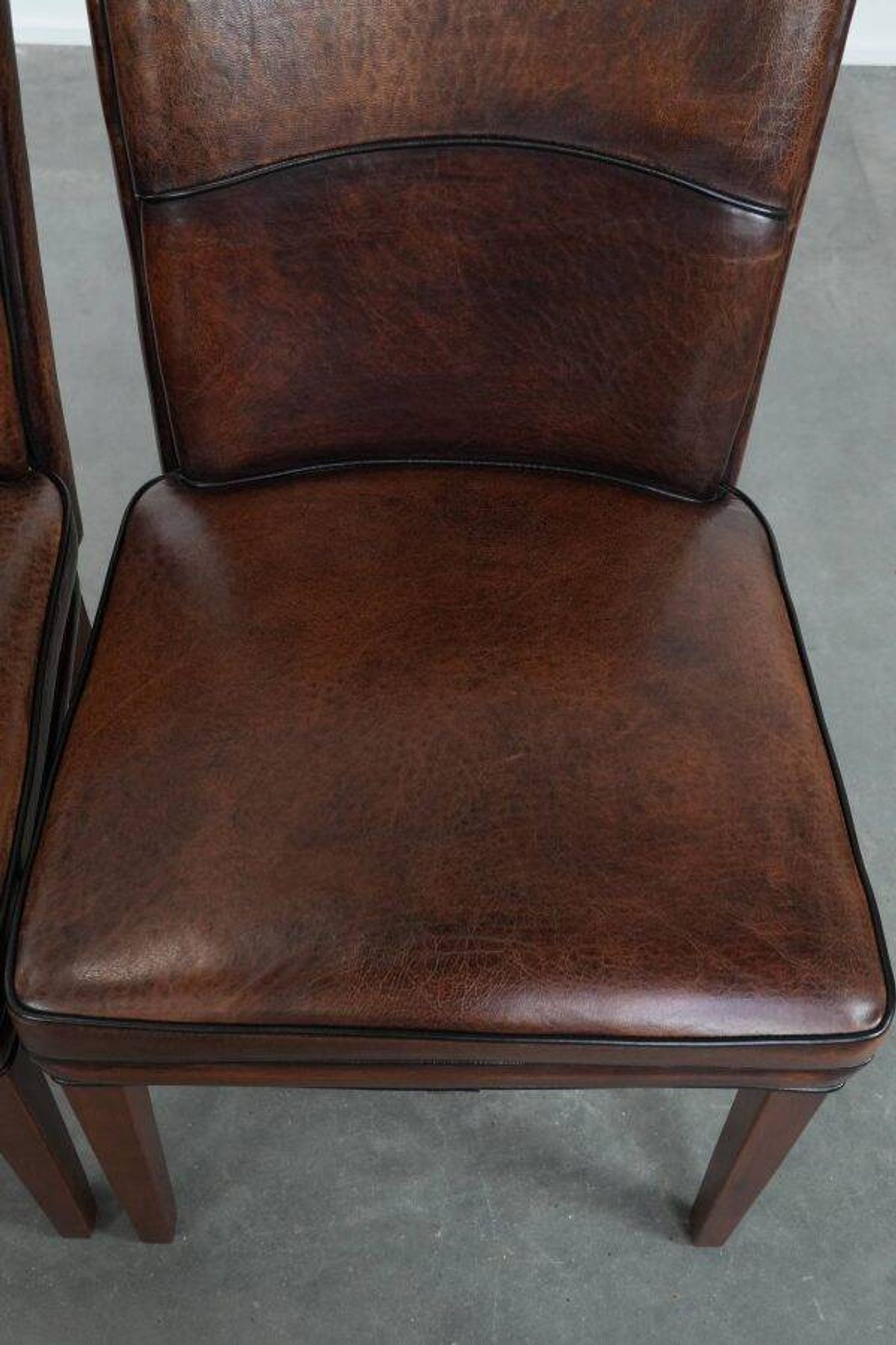 Comfortable set of 2 sheep leather dining chairs with character