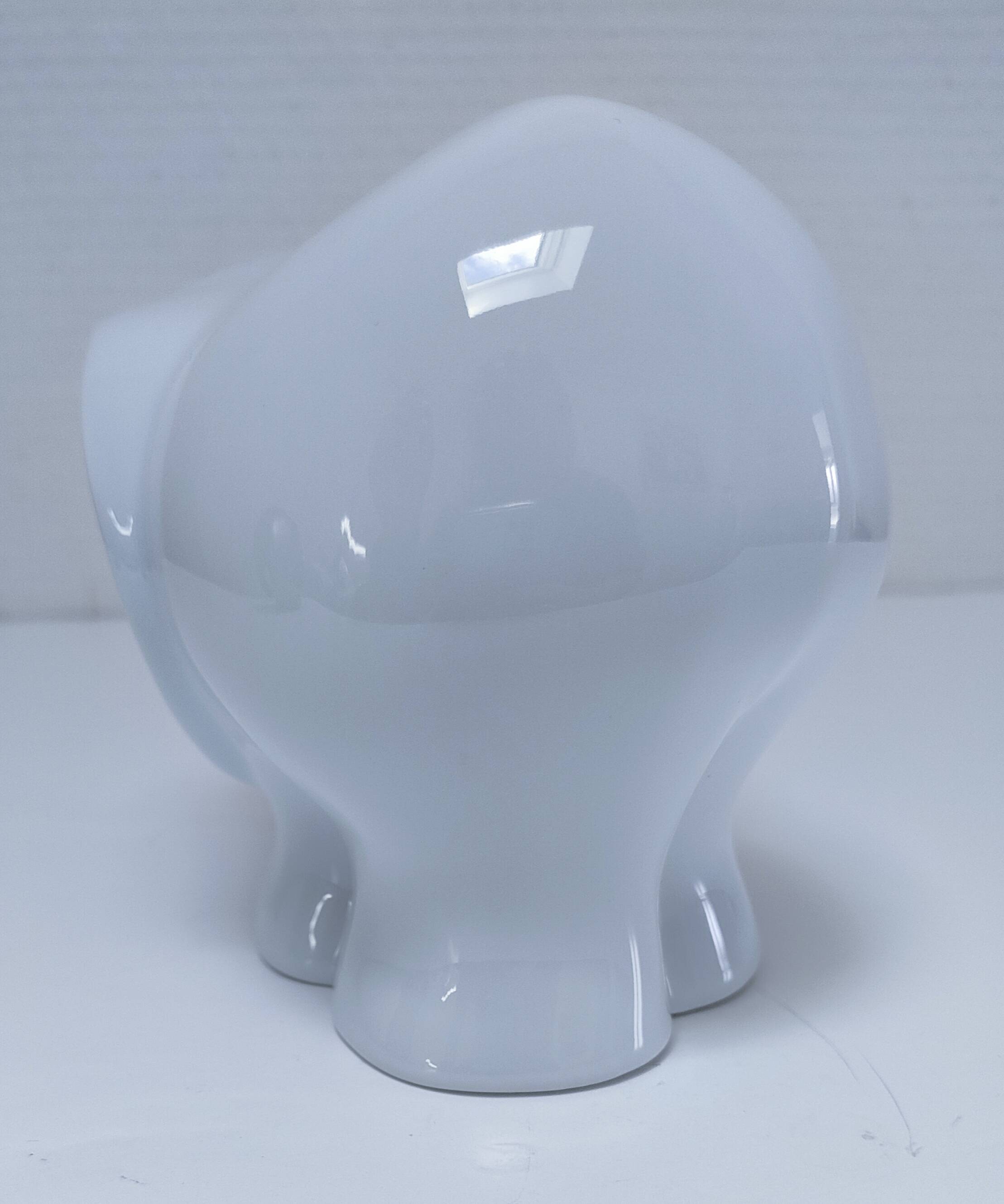 Two iridescent black and white ceramic elephants design