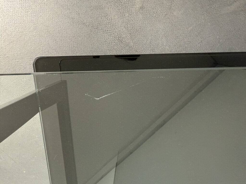 Pair of bedside tables, bedside consoles, black lacquer with glass tops, Italy, 1970s