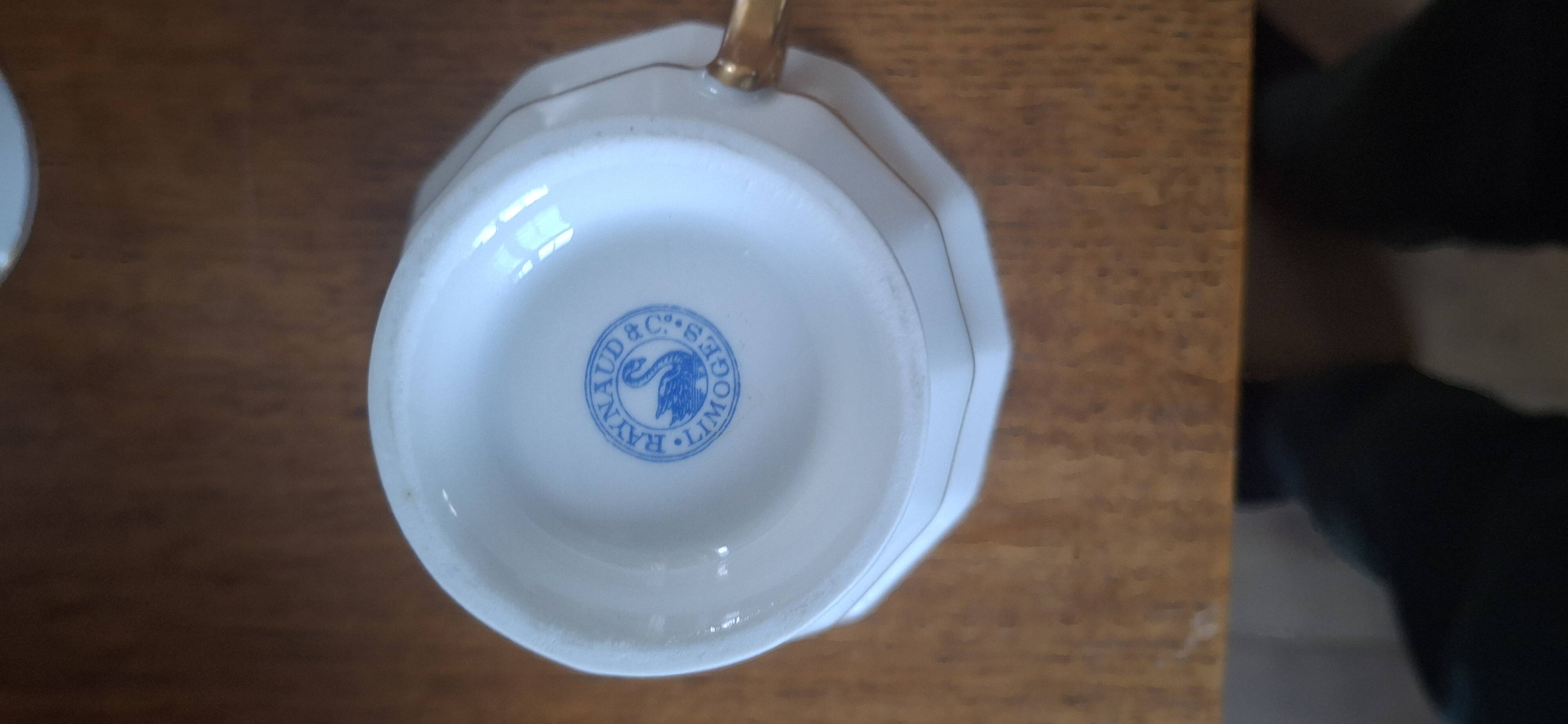 Set of 11 cups and saucers