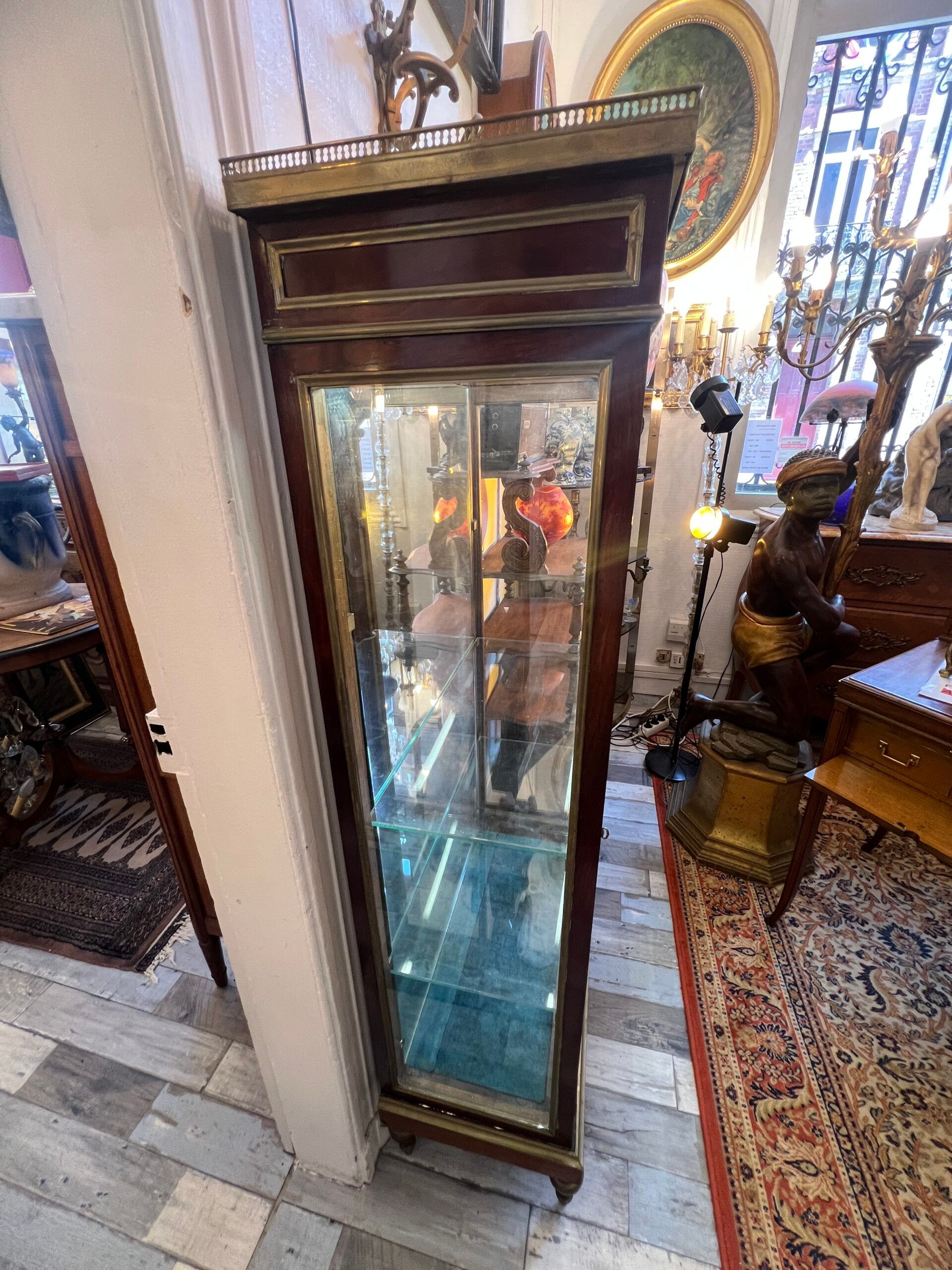 Louis XVI style display cabinet, in mahogany and mahogany veneer, with a red marble top with gallery