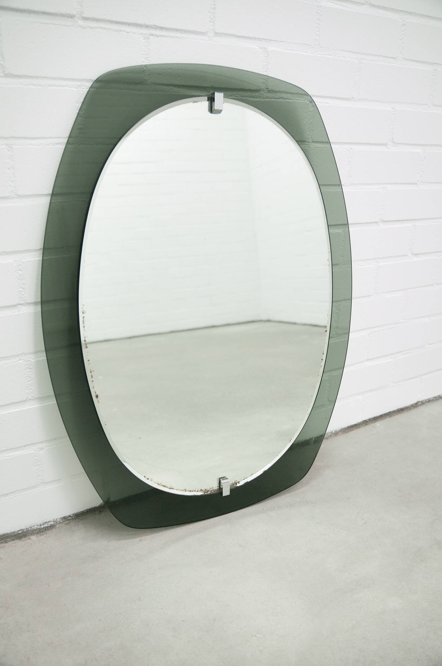 Vintage space age large smoked green glass mirror by veca