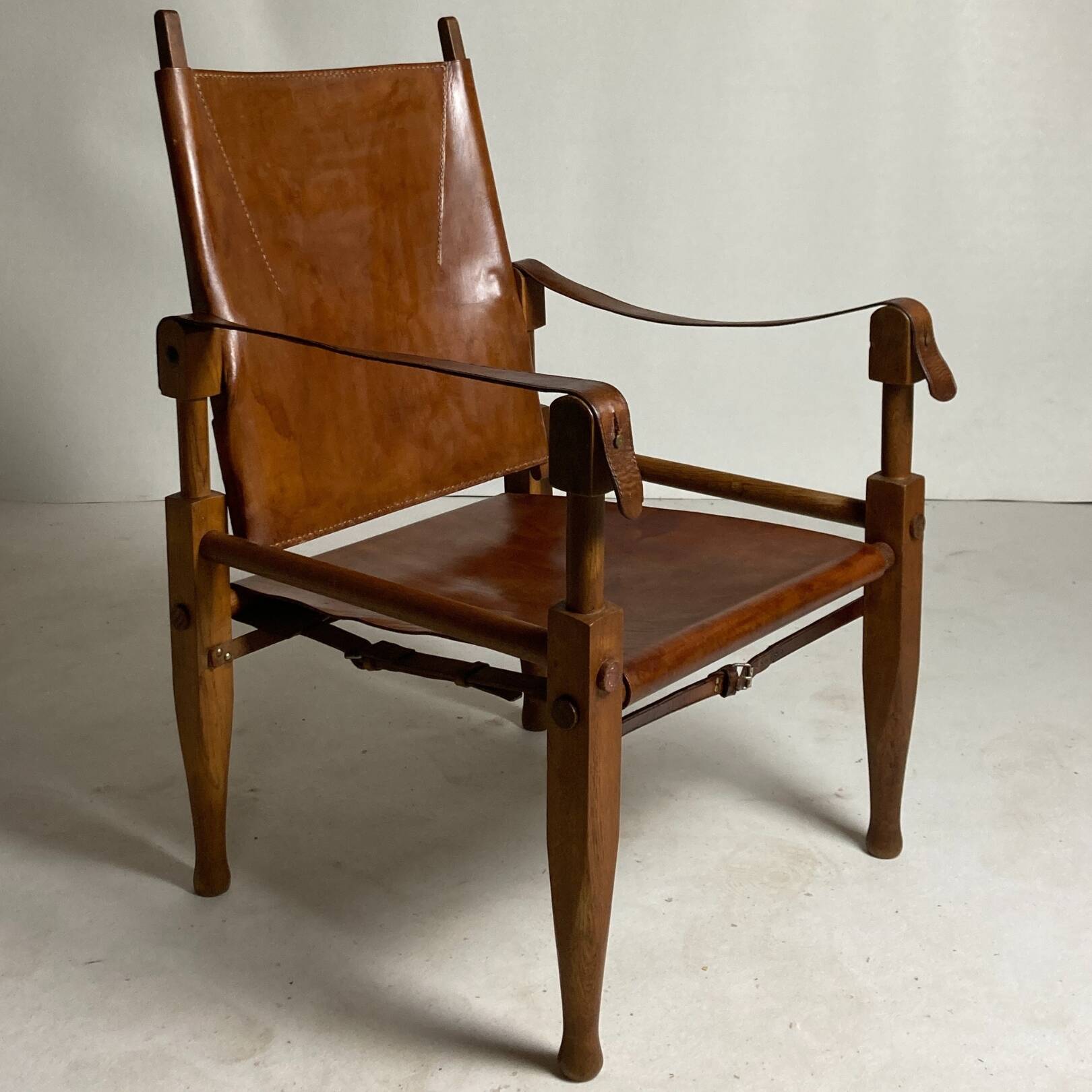 Leather safari armchair by Wilhelm Kienzle for Wohnbedarf, 1950s