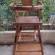 Chaise haute en bois pour bébé vintage