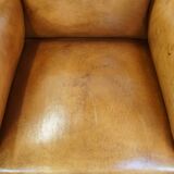 Restored antique Art Deco sheep leather armchair