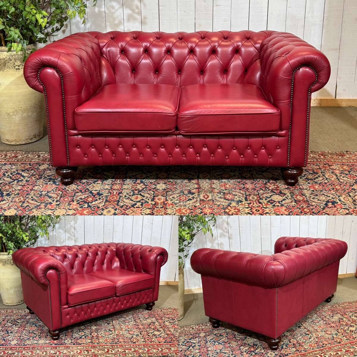 Chesterfield 2-seater leather sofa, modern production from the 2000s.