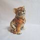 Vintage animal sculpture in Italian ceramic depicting a tiger cub.