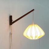 Mid-century pivoting wall lamp with a swing arm, Cocoon, made of teak wood, 1960s.