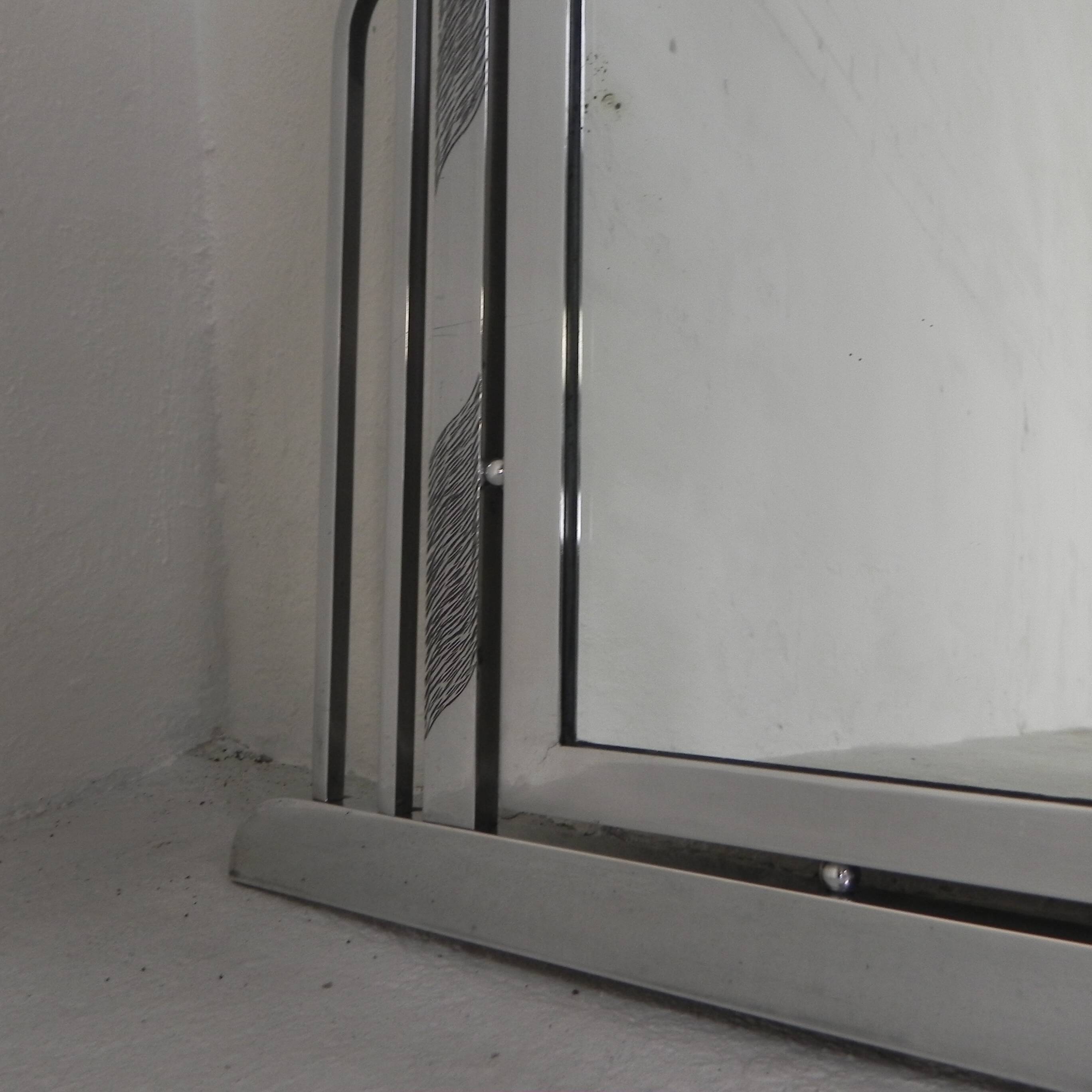 Art Deco mirror with faceted glass in aluminum frame, 1930s