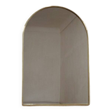Brass wall mirror in the shape of a handmade holder