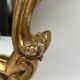 Wooden mirror with gilded stucco