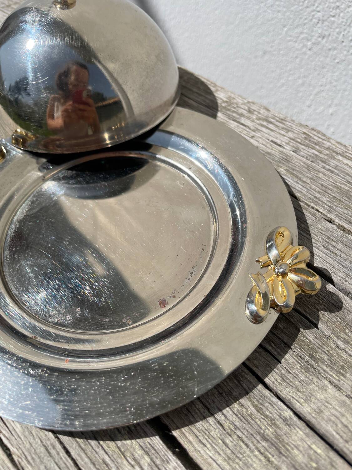Silver-plated metal butter dish with knots