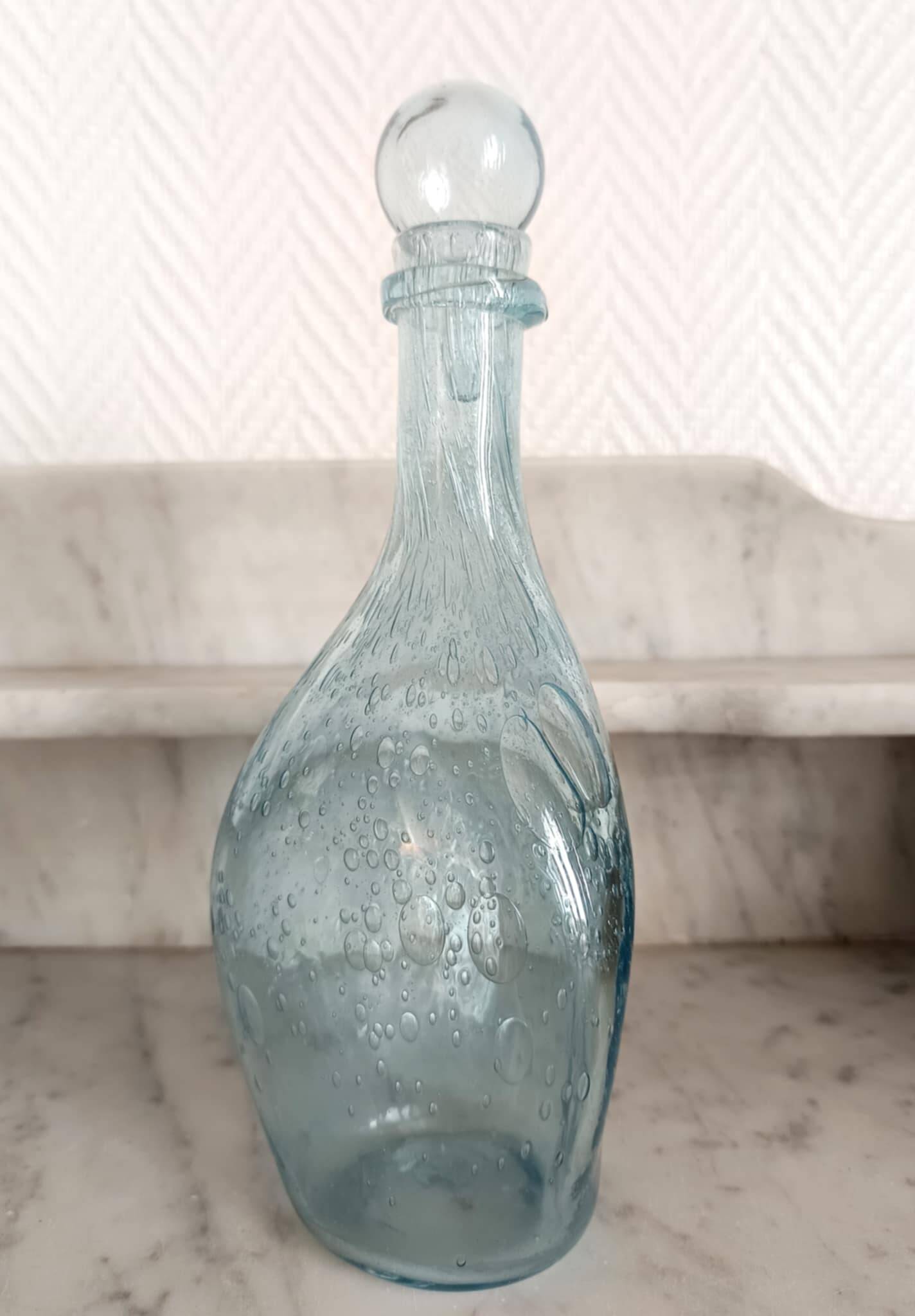 Two bubble glass carafes