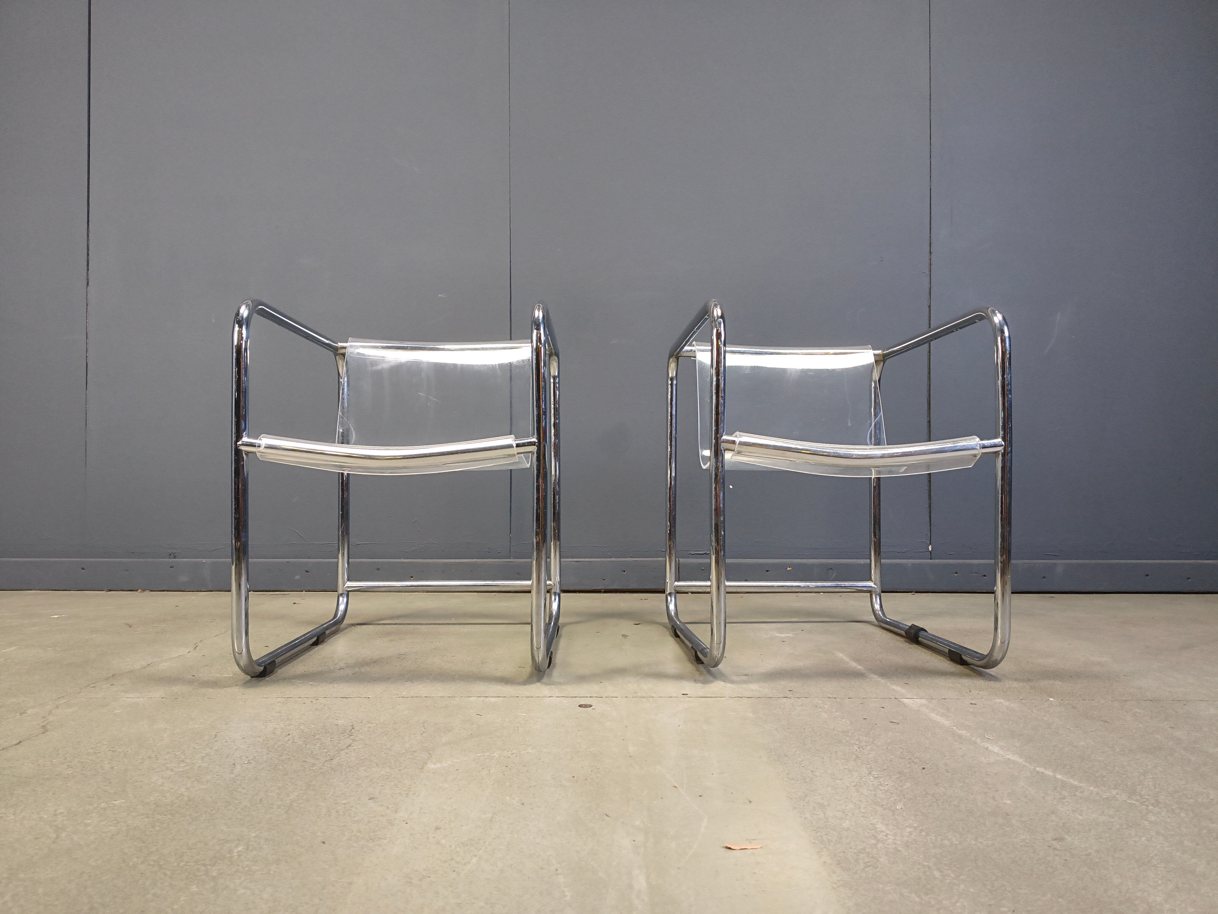 Pair of plexiglass and tubular chrome armchairs, 1970s