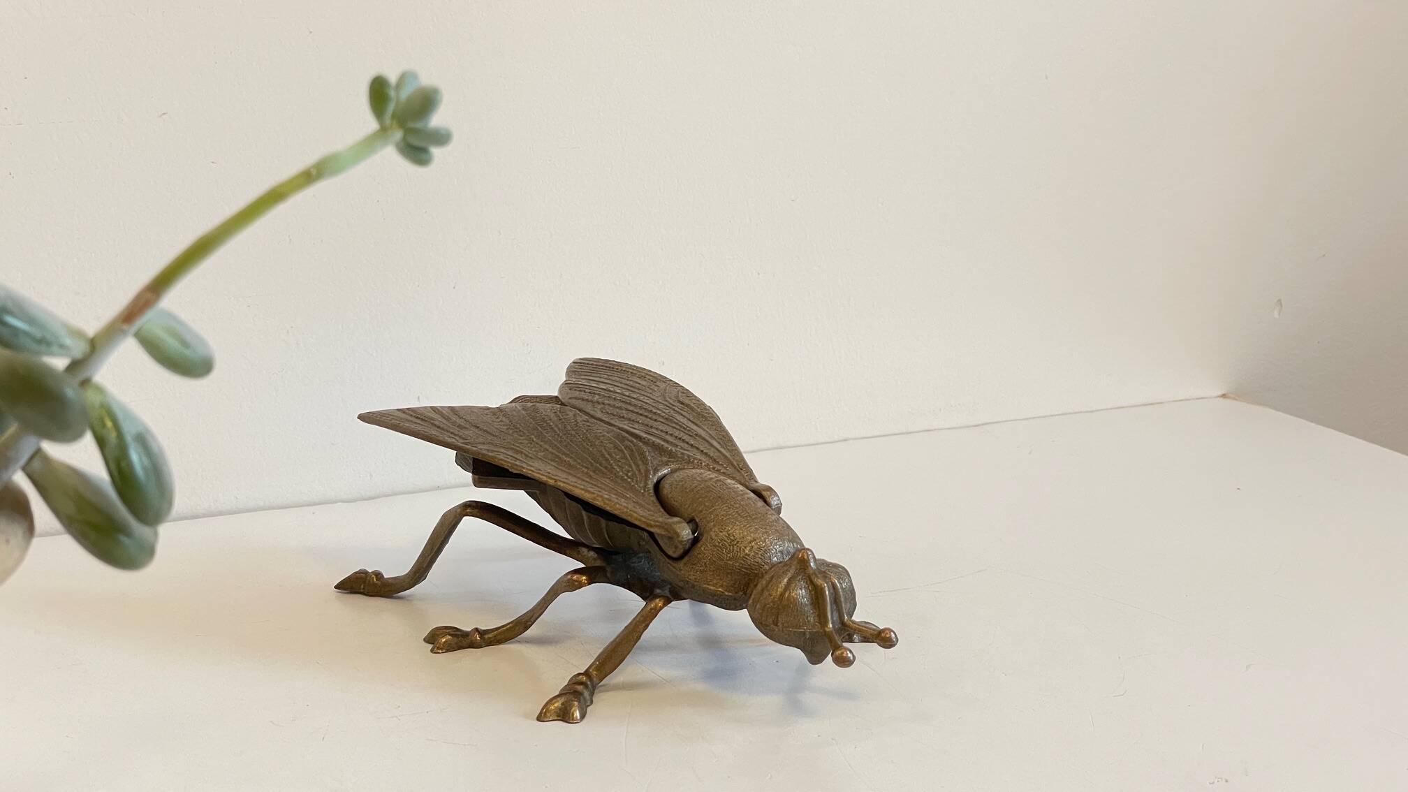 Vintage fly ashtray in patinated metal