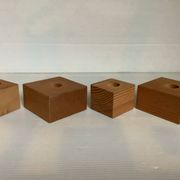 Quatre bougeoirs en bois scandinave