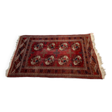 Red wool carpet, geometric pattern.