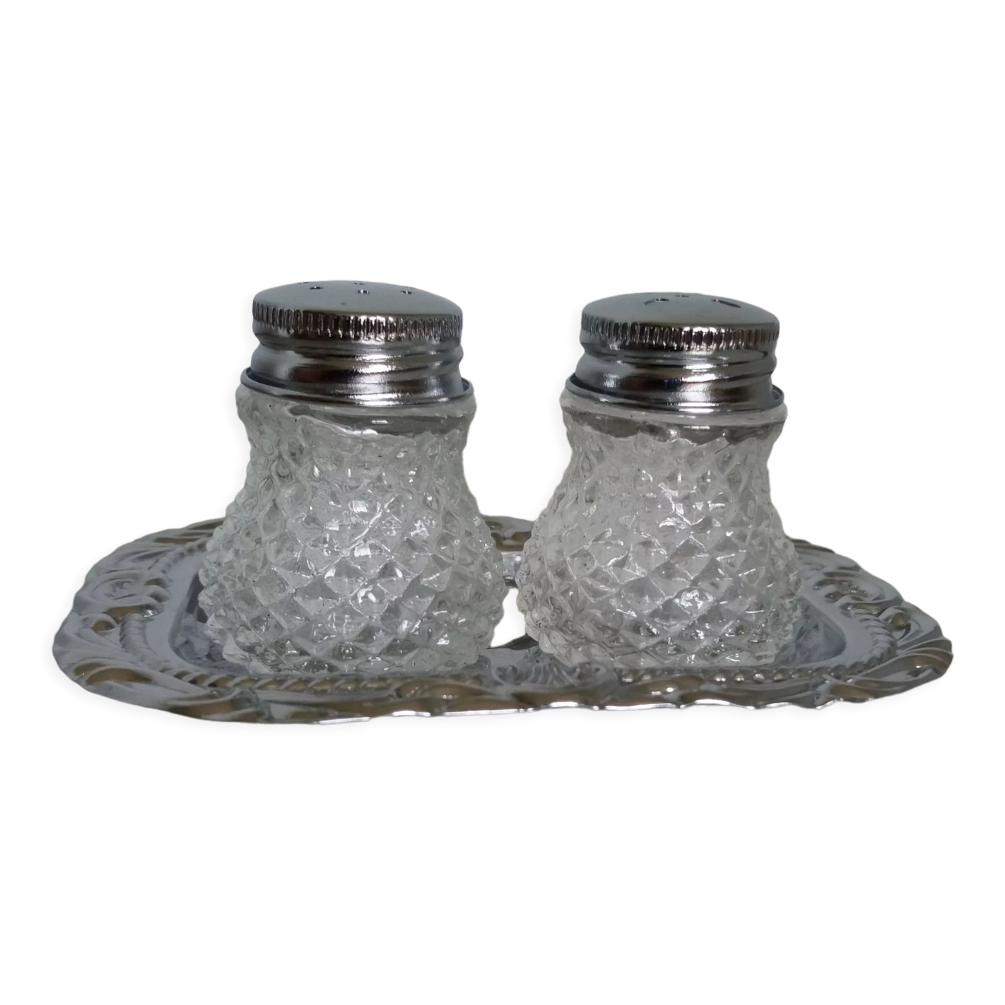 Salt shaker and pineapple shaped pepper