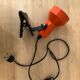 Orange pinch lamp