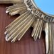 Vintage sun mirror in 60s/70s gold resin