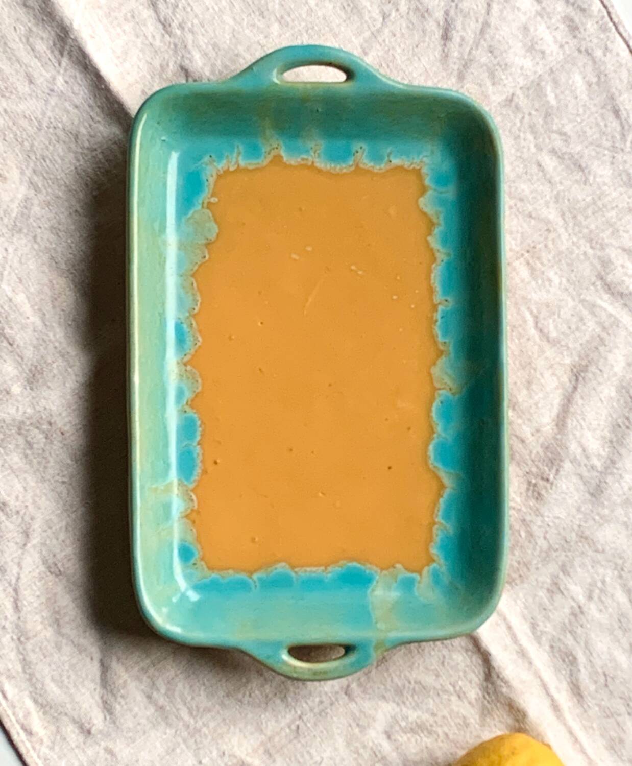 CAB turquoise and ochre ceramic dish with handles