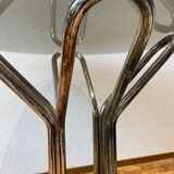 Round table in chrome and smoked glass