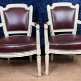 Pair of Louis XVI cabriolet armchairs in lacquered wood and leather circa 1850