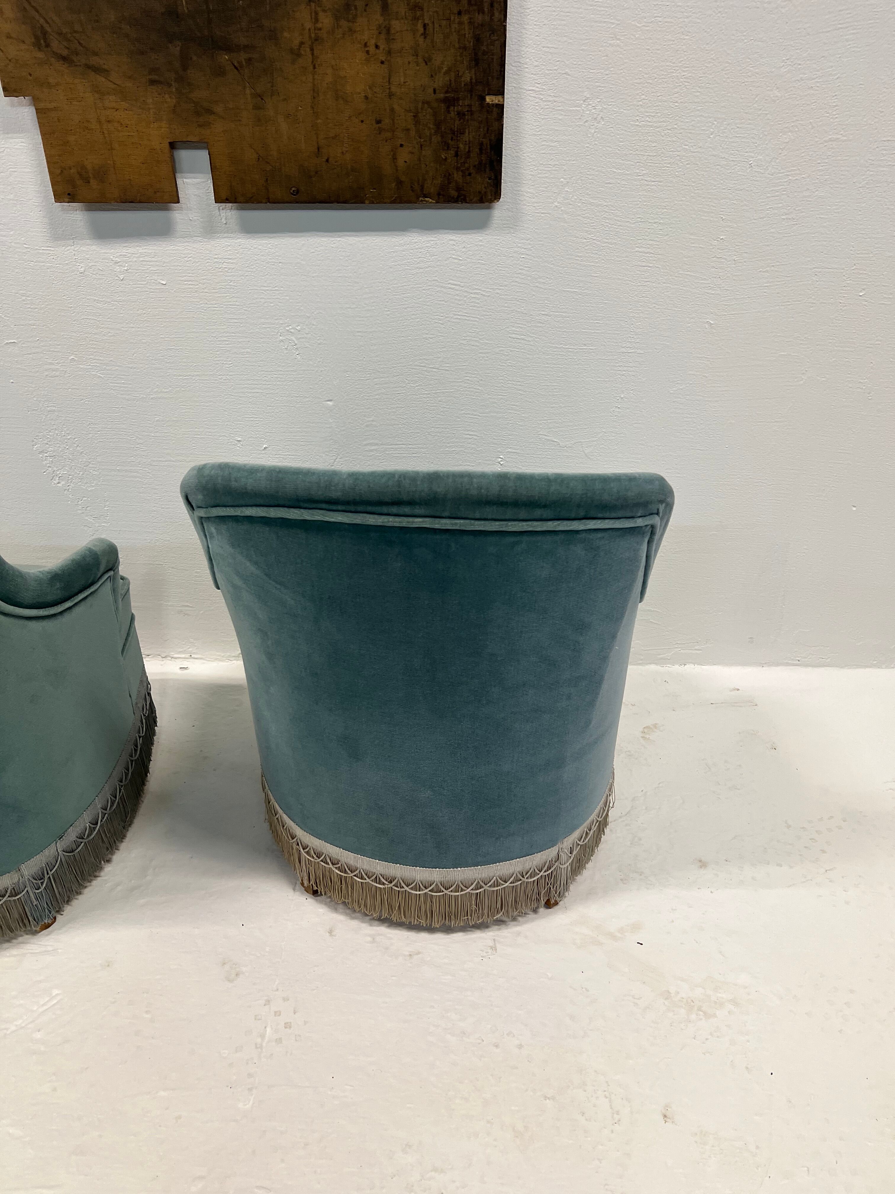 Duo of upholstered blue toad armchairs