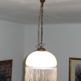 Vintage suspension in half shell speckled with pearls