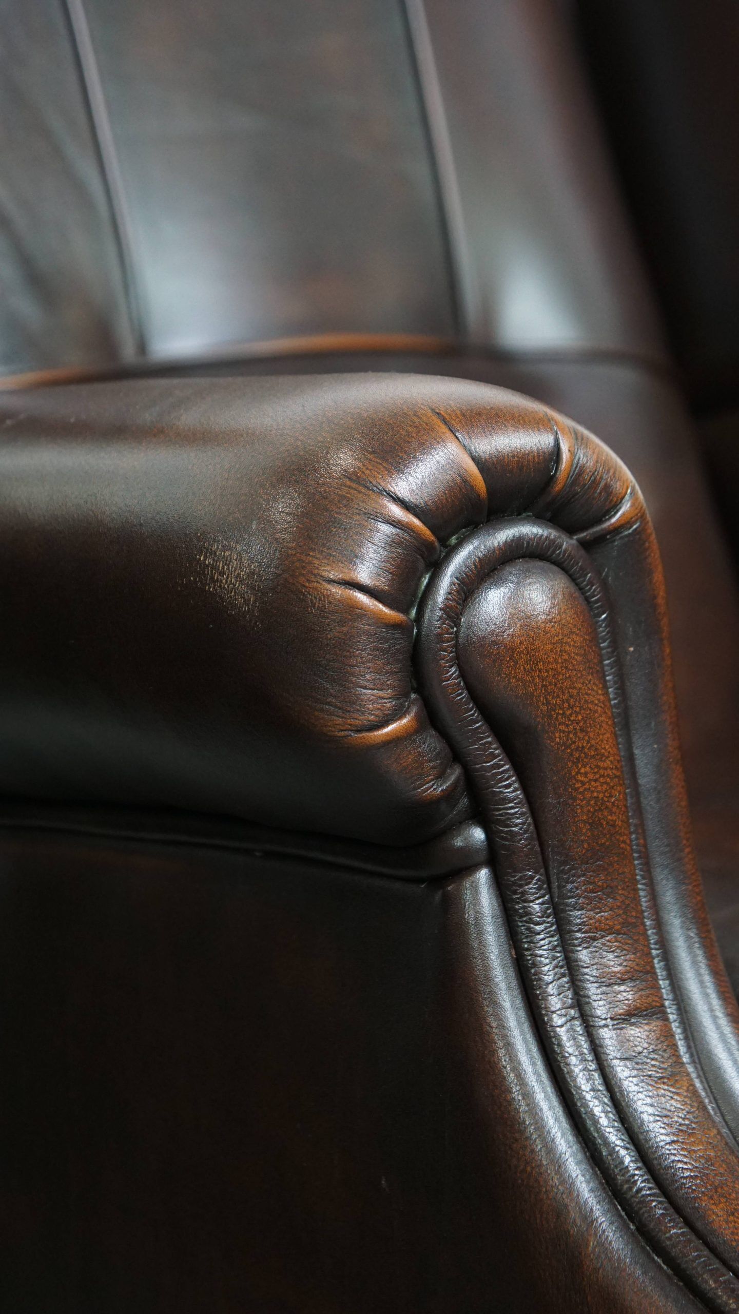 Comfortable and very beautiful set of 2 cow leather wingback armchairs in English style