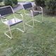 Paire de chaises de jardin cantilever en fer peint et bois, années 1930