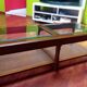 Coffee table in wood, glass and rattan