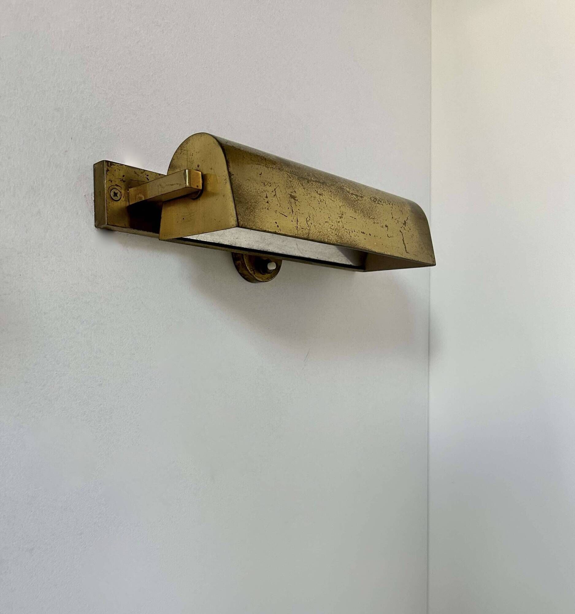 Pair of vintage modernist wall lights, adjustable in brass, France 1940