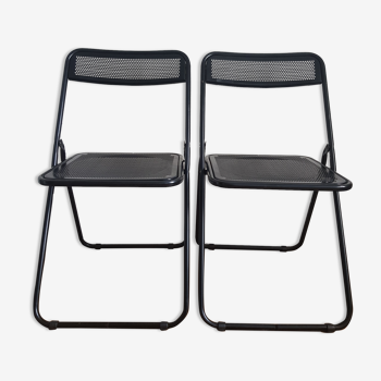 Set of 2 black folding chairs in perforated metal