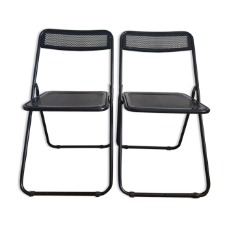 Set of 2 black folding chairs in perforated metal