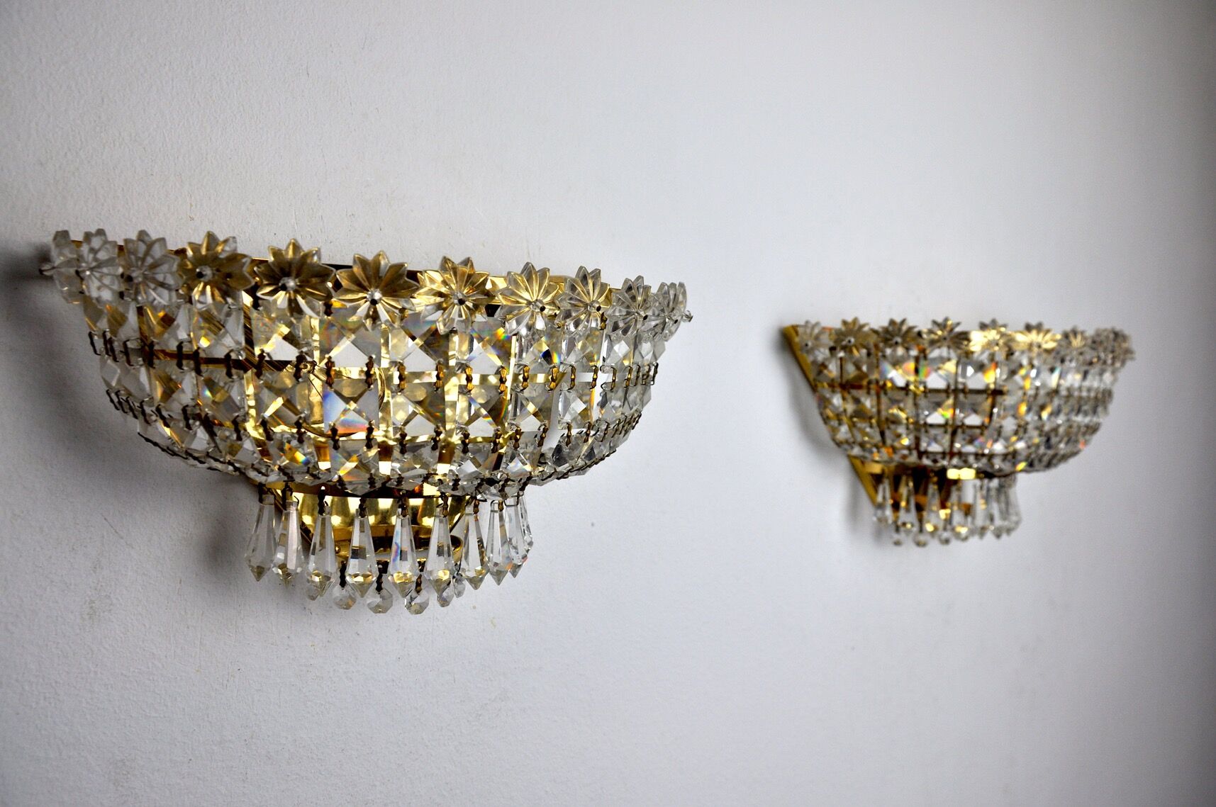 Pair of Regency wall lamps, cut crystals, Italy, 1980