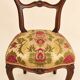 Carved walnut Napoleon III style velvet medallion chair