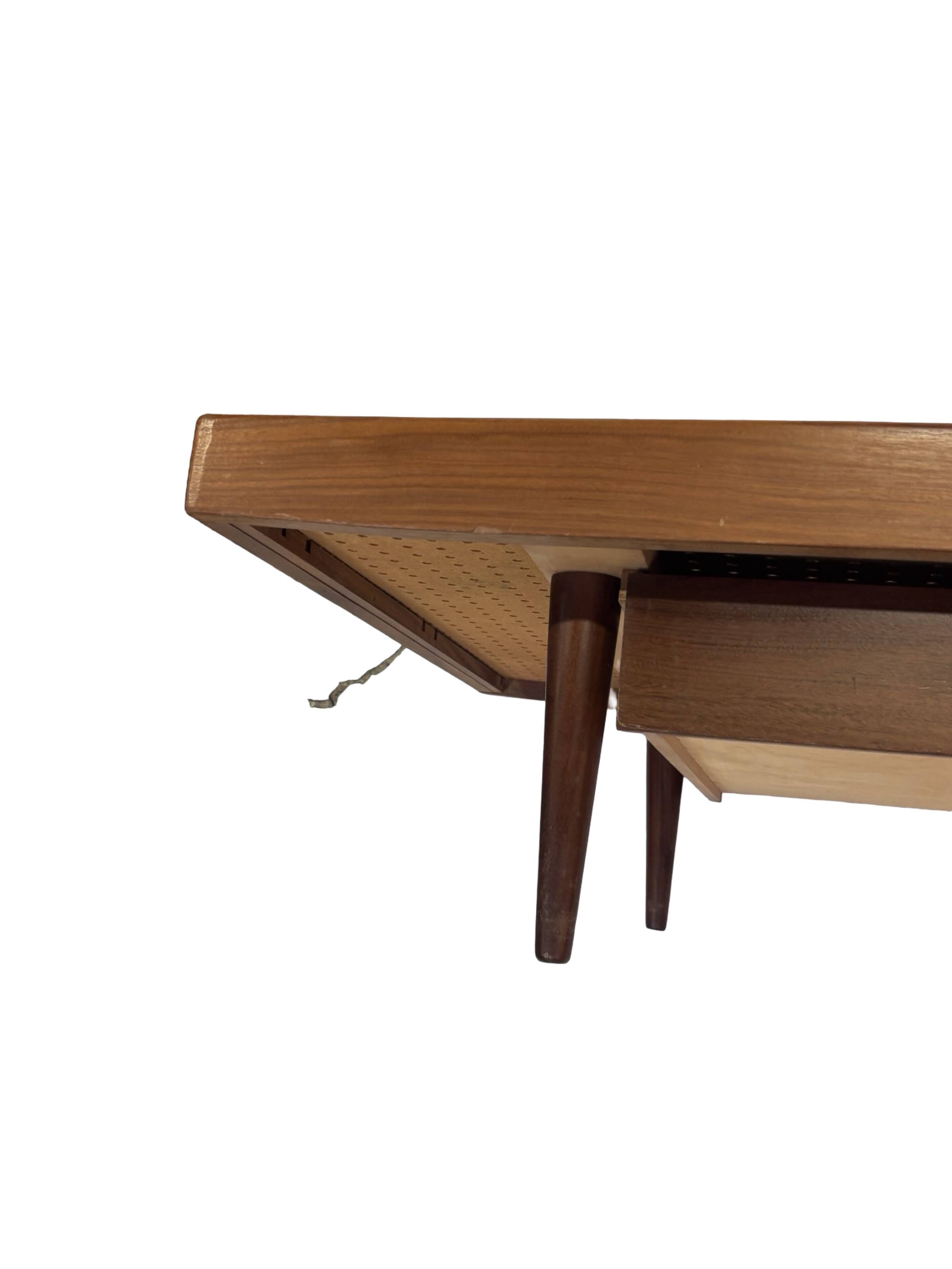 Vintage 1950s teak sofa bed with drawers.