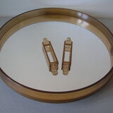 Old round mirror of the 1970s in glass and plexi